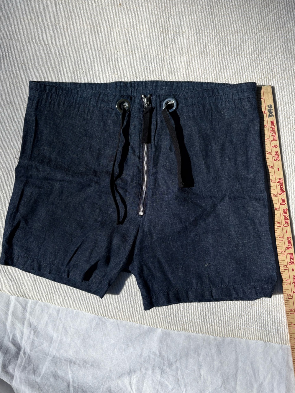 Marni Lightweight Denim shorts with drawstring and zip fly.